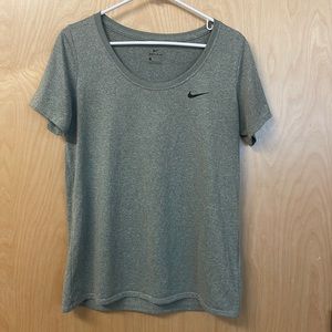 Perfect condition NIKE swoop neck short sleeved shirt. No defects. Size large.